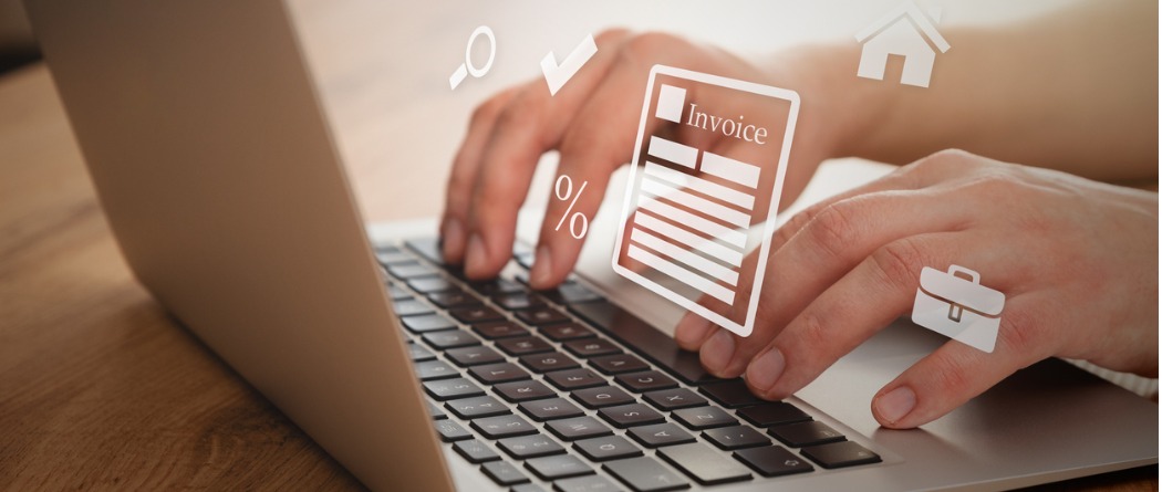 Man typing on laptop for business online banking