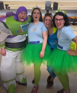 CSB employees dressed as Buzz Light Year and Pizza Planet employees