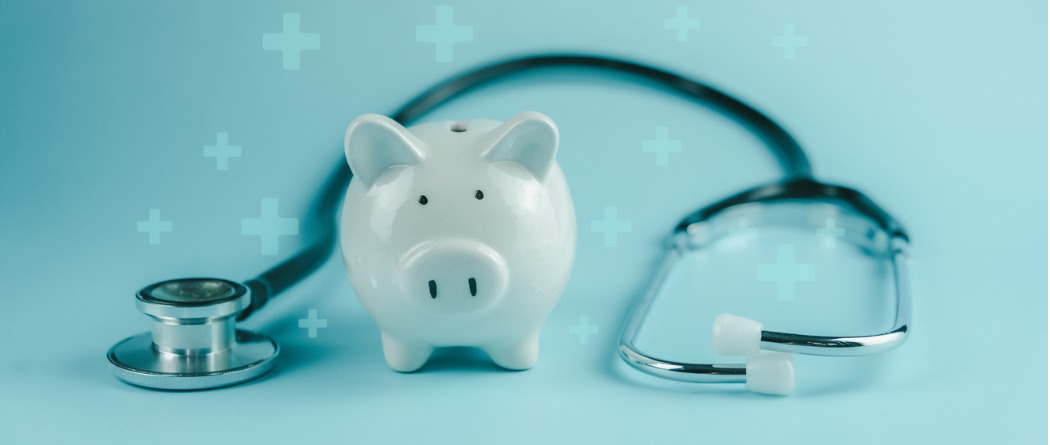 Piggy bank with a stethoscope.